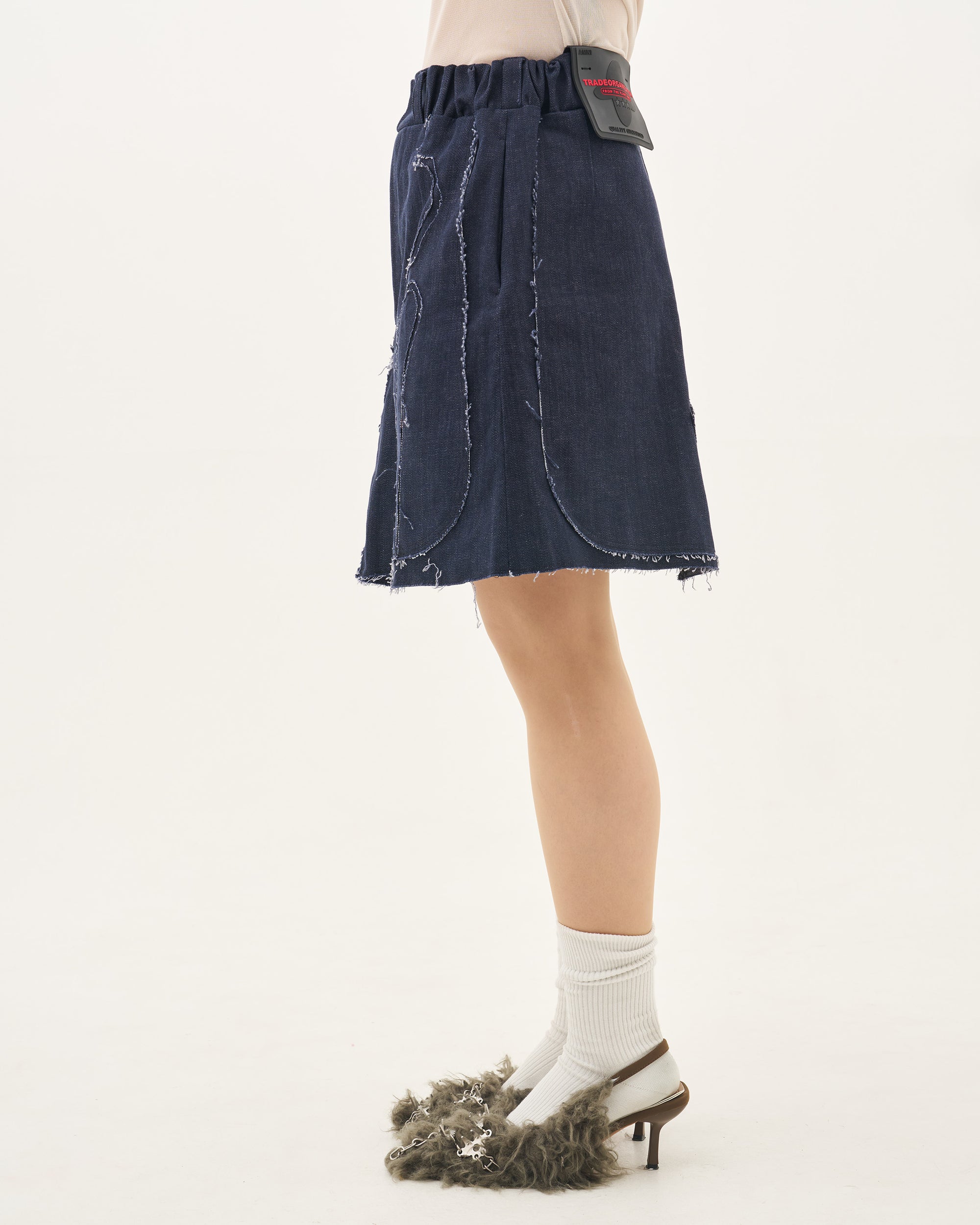 Skeleton denim skirt march